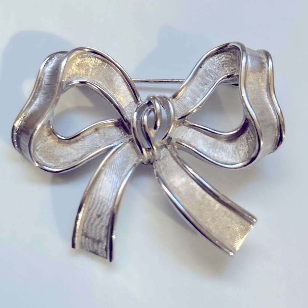 Vintage Crown Trifari brushed silver tone brooch